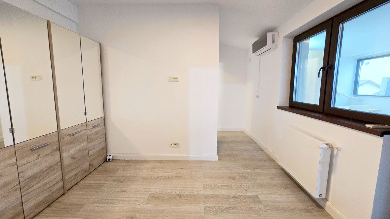 Gh. Ionescu Sisesti 59. Apartament intim in bloc elegant cu gradina